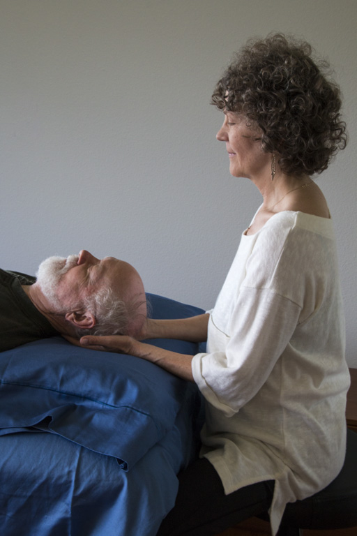 Cynthia Flowers performing craniosacral therapy
